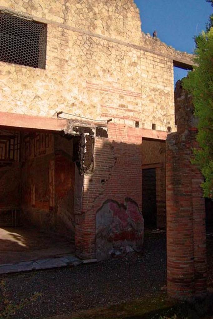VI.17, Herculaneum. February 2003.
Looking towards north-east corner of peristyle, with doorway to room 13, on left.
Photo courtesy of Nicolas Monteix.